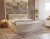 Elegantes Boxspringbett in Beige mit geripptem Stoffbezug und Kopfteil.
