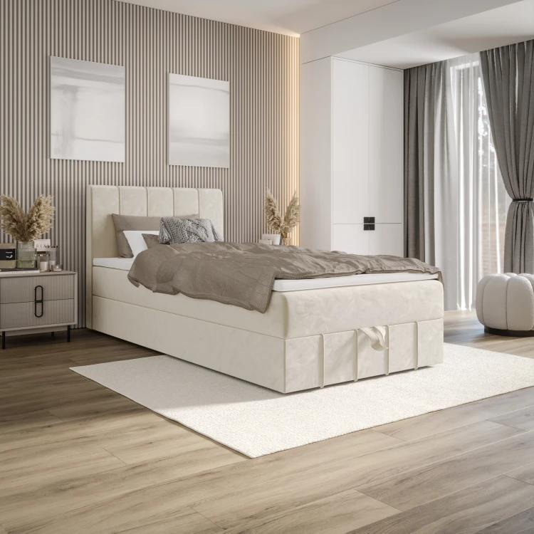 Beiges Einzelbett in stilvollem Schlafzimmer mit dekorativen Wandelementen.