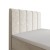 Nahaufnahme vom gepolsterten Kopfteil in hellem Beige.