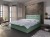 Mintgrünes Boxspringbett in hellem, modernen Schlafzimmer mit Industriedesign-Elementen.